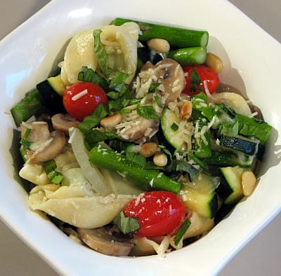 Pesto Tortellini with Sautéed Vegetables and Parmesan Cheese