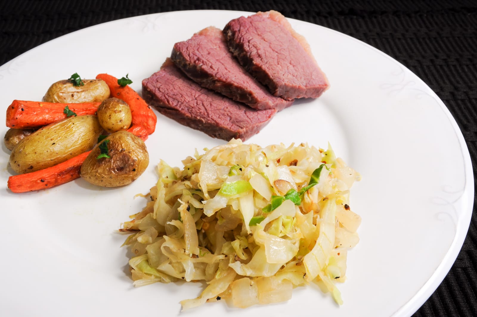 Corned Beef, Sautéed Cabbage and Onions, and Roasted Potatoes and Carrots