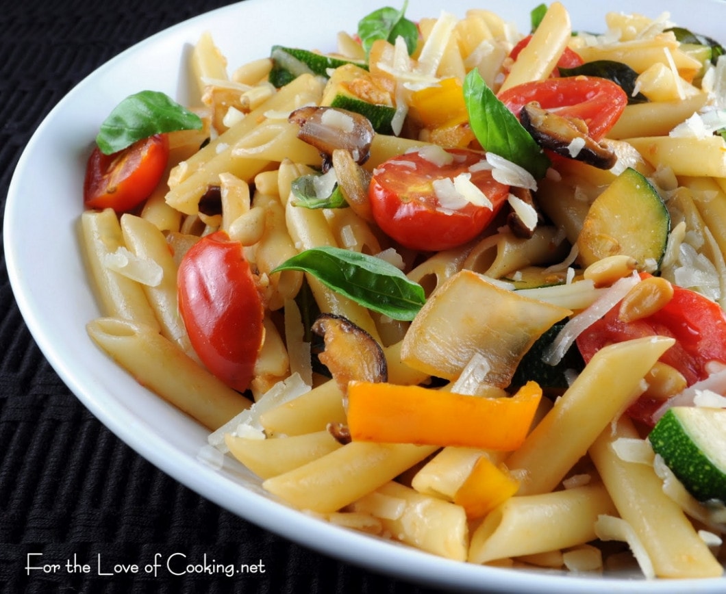 Penne with Mixed Vegetables, Parmesan Cheese, and Pine Nuts