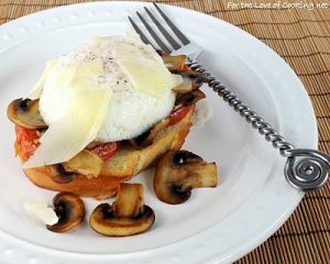 Poached Eggs on Toast with Roasted Tomatoes, Caramelized Mushrooms, and Shaved Parmesan