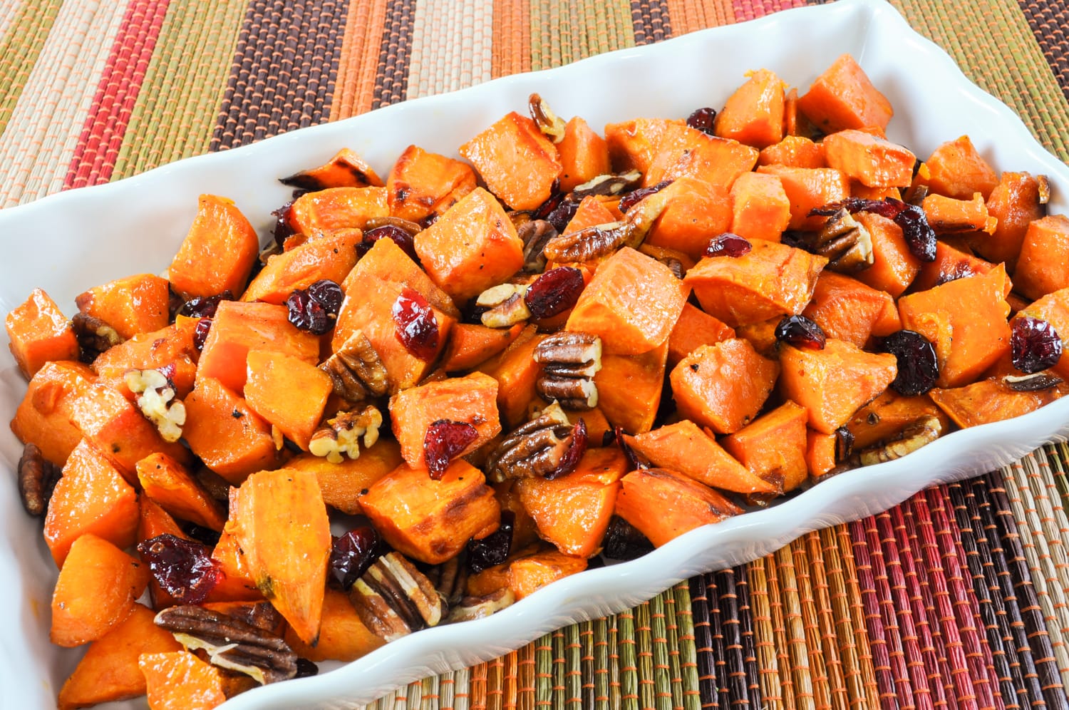 Roasted Yams with Maple, Dried Cranberries, and Pecans