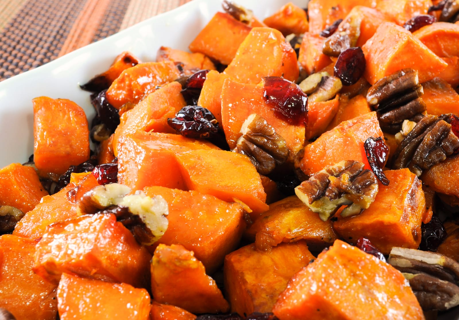 Roasted Yams with Maple, Dried Cranberries and Pecans