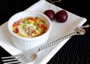 Baked Eggs with Bacon, Tomatoes, and Sharp Cheddar
