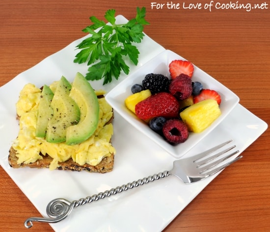 Fluffy Scrambled Eggs and Avocado Slices on Toast