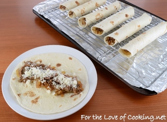 Shredded Beef, Caramelized Onion, and Cotija Cheese Baked Flautas