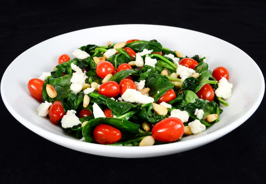 Spinach Sauté with Grape Tomatoes, Feta Cheese, and Toasted Pine Nuts