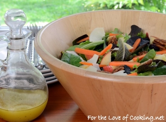 Mixed Greens Salad with Apples, Carrots, Candied Pecans, and Parmesan topped with Maple-Mustard Vinaigrette