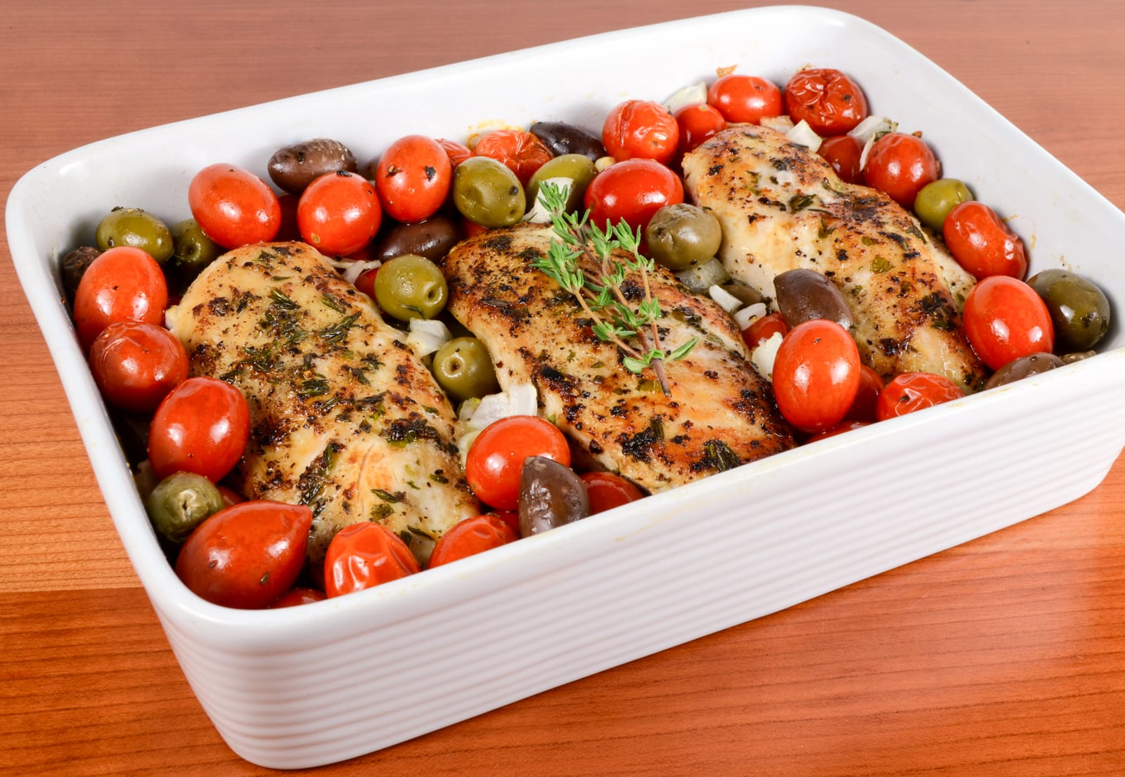 Baked Mediterranean Chicken Breasts with Tomatoes, Olives, Capers, and Garlic