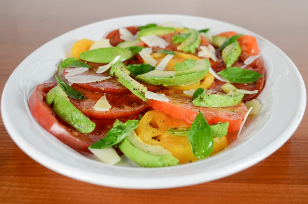 Sliced Heirloom Tomato and Avocado Salad with Basil and Shaved Parmesan