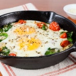 Baked Eggs with Sautéed Onions, Tomatoes, and Spinach