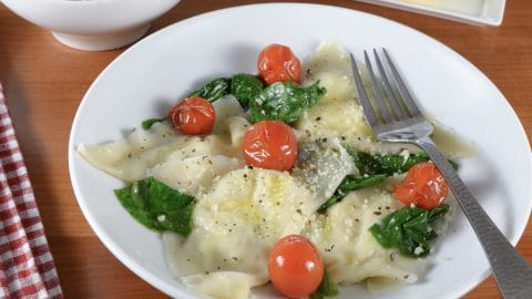 Basil Ricotta Ravioli with Spinach and Blistered Tomatoes