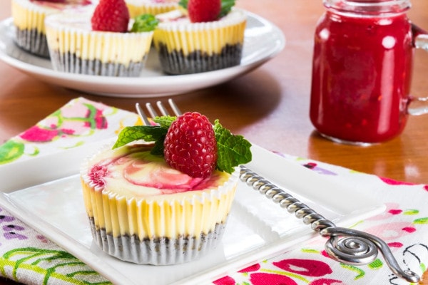 Mini Raspberry Swirl Cheesecakes with Chocolate Crust