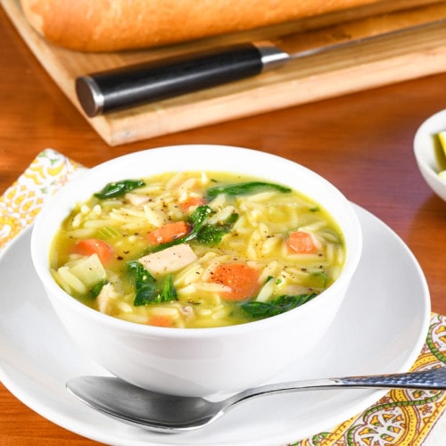 https://fortheloveofcooking-net.exactdn.com/wp-content/uploads/2023/10/Lemon-Chicken-Orzo-Soup-with-Spinach-3841-2.jpg?strip=all&lossy=1&quality=90&resize=500%2C500&ssl=1